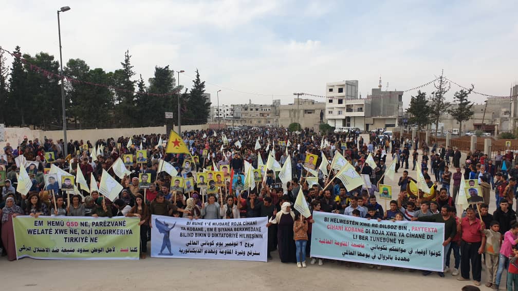 Photo of مسيرة حاشدة في كوباني بمناسبة اليوم العالمي للتضامن مع كوباني